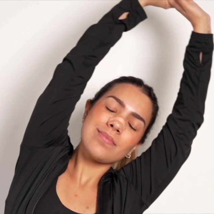 Woman stretching with a HASLOM Premium nasal strip